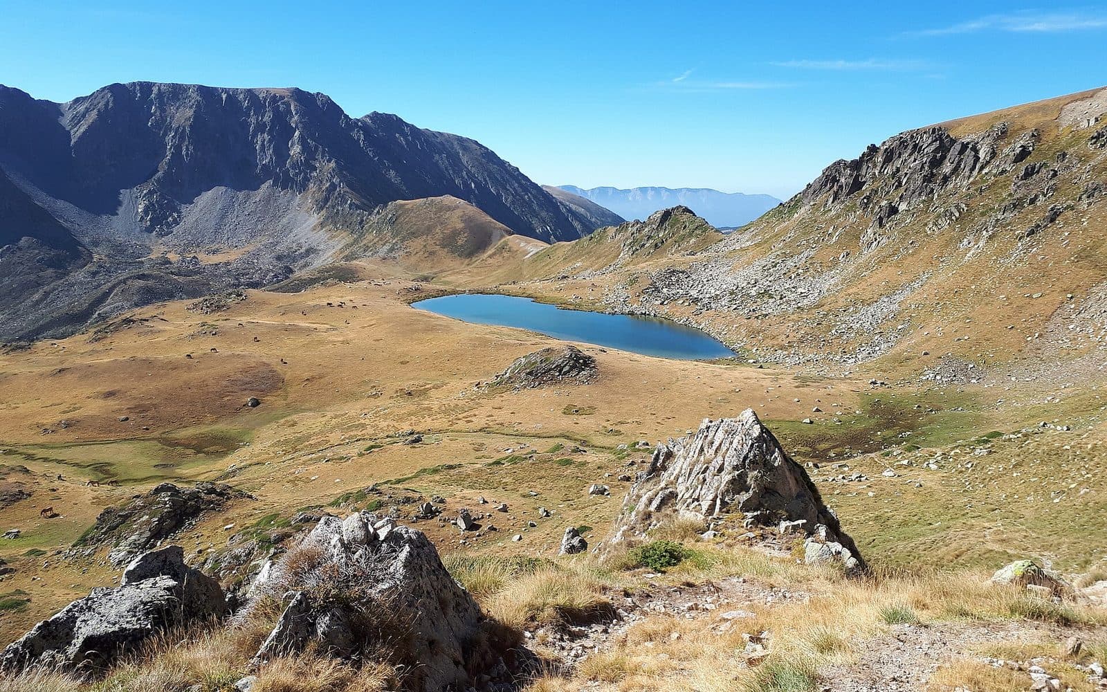 A glacial lake in a high Pyrenean valley